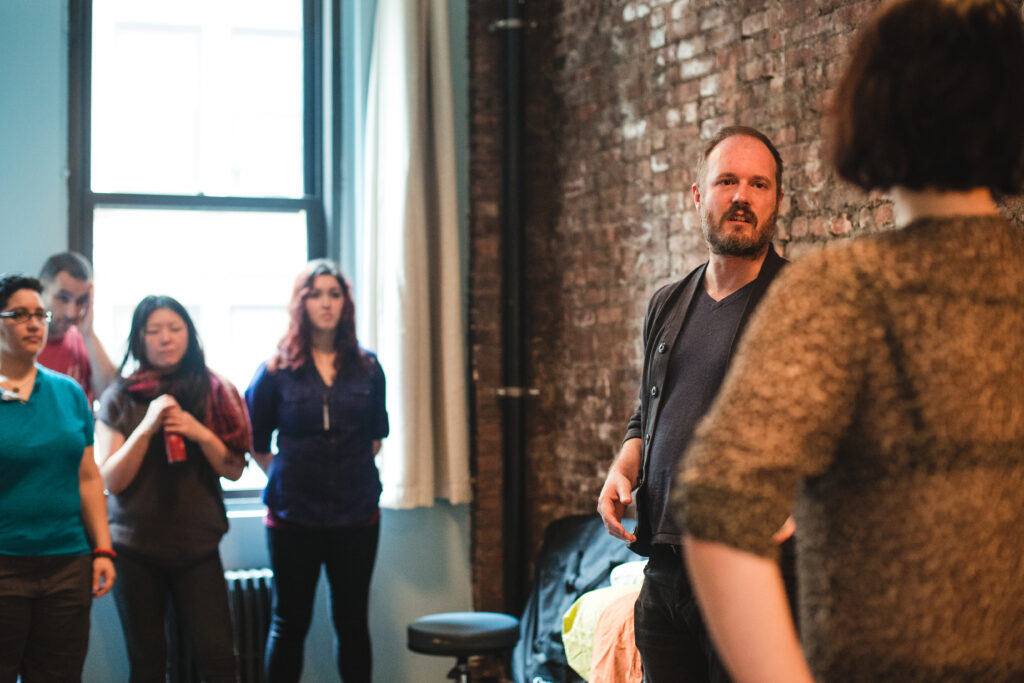 David Weintraub teaching advanced massage therapy techniques to a group of licensed therapists at Bodyworks DW in NYC.